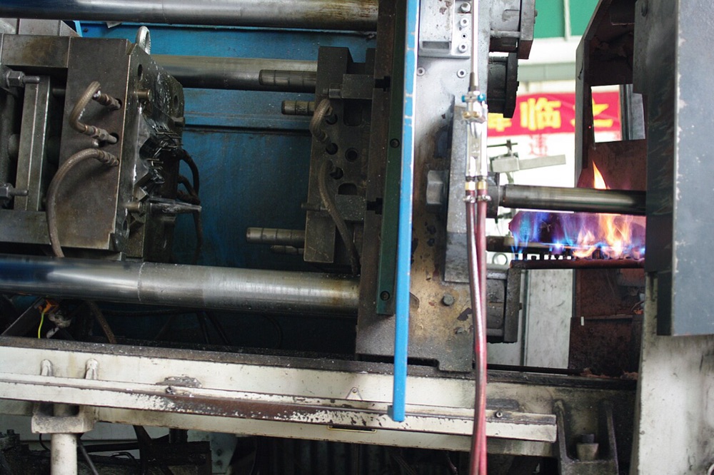 Die casting dies mounted in a casting machine